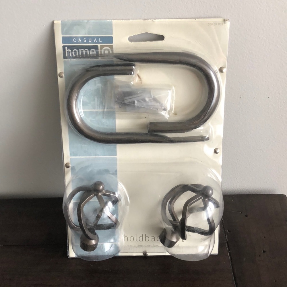 Decorative window hardware holdback set